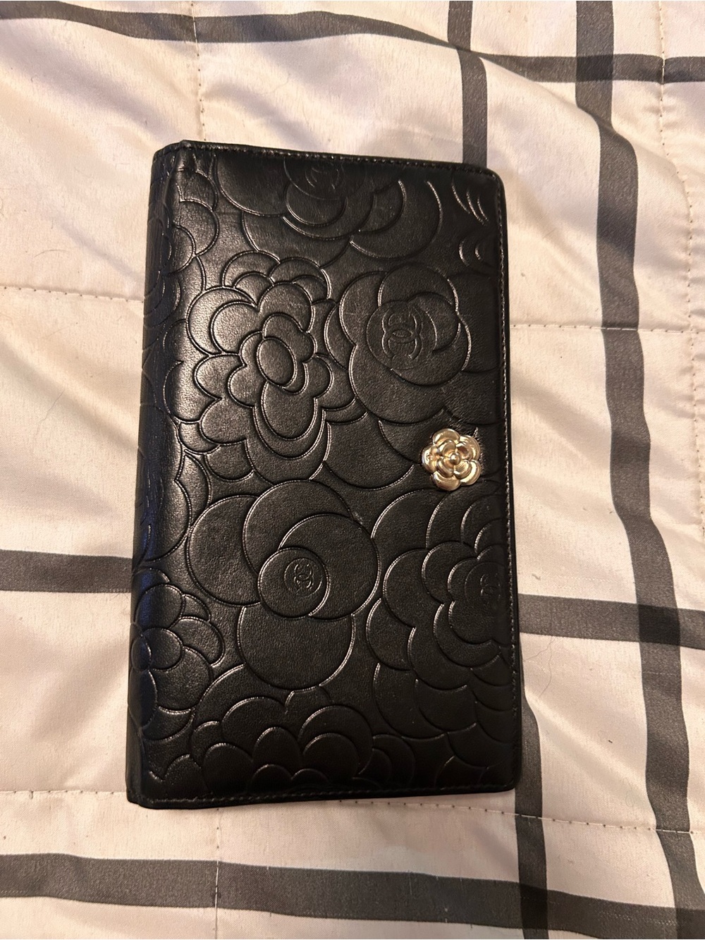 CHANEL Black Quilted Camellia Embossed Long Wallet with Gold Flower Accent